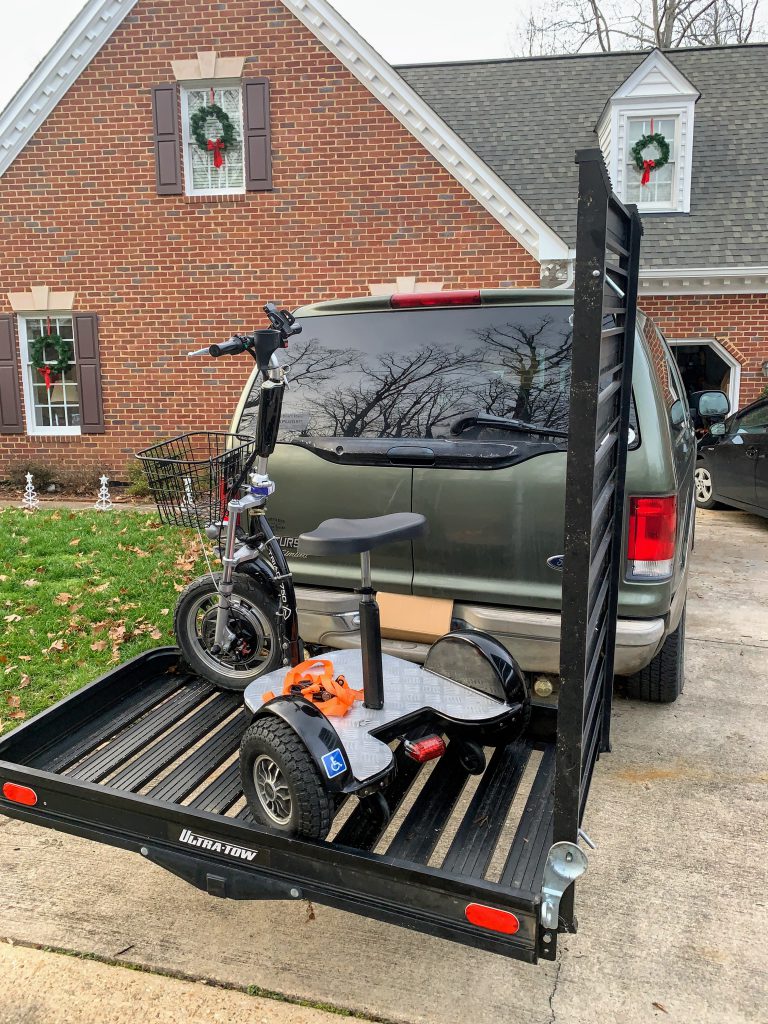 Triad Mobility Scooter angled on carrier and ready to be secured