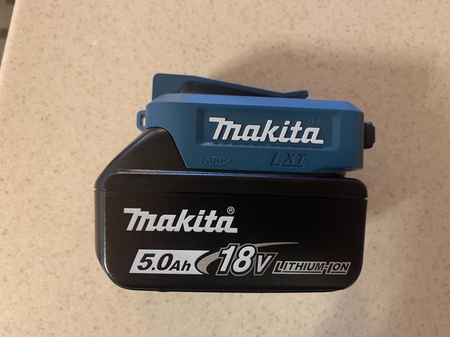 Makita USB power adapter and battery side view